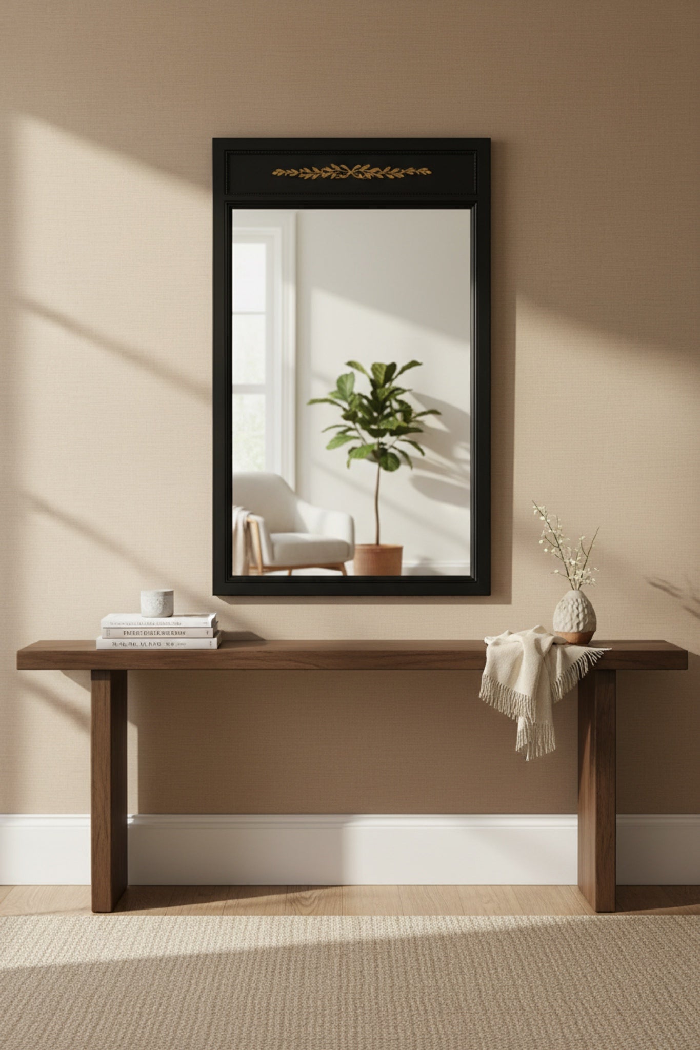 Elegant black framed mirror with gold accents, perfect for home decor and entryway styling.
