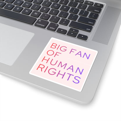 Laptop with a sticker reading 'Big Fan of Human Rights' on the palm rest area.