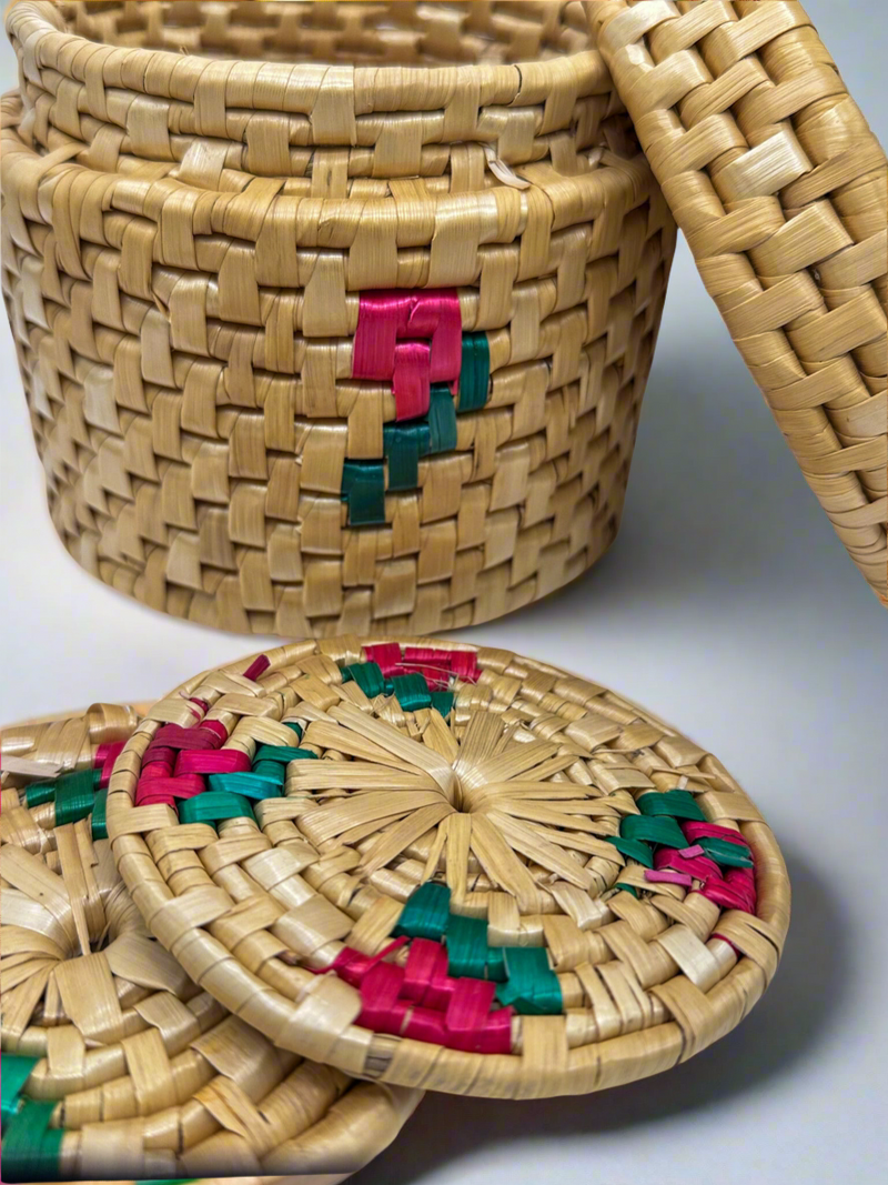 Handwoven natural straw basket with colorful accents, ideal for storage, includes matching coasters.