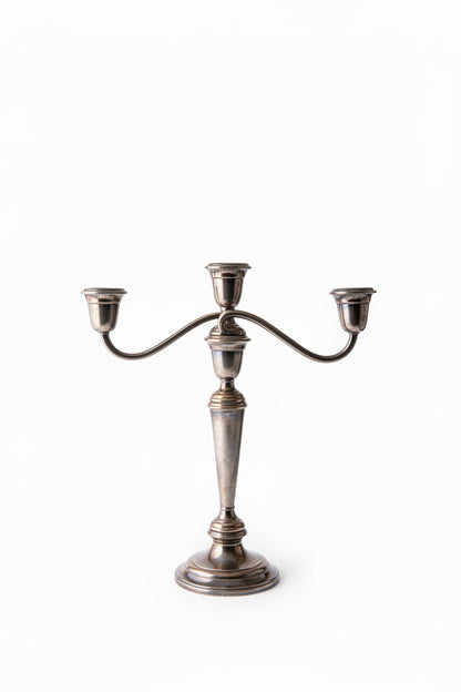  Close-up of base of Gorham Newport silverplate candelabra showing stamped maker's mark reading NEWPORT SILVERPLATE YB 586/1 with warm oxidized patina on polished metal