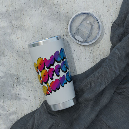 Silver tumbler with colorful "Power Coffee Drinker"  design on a gray surface