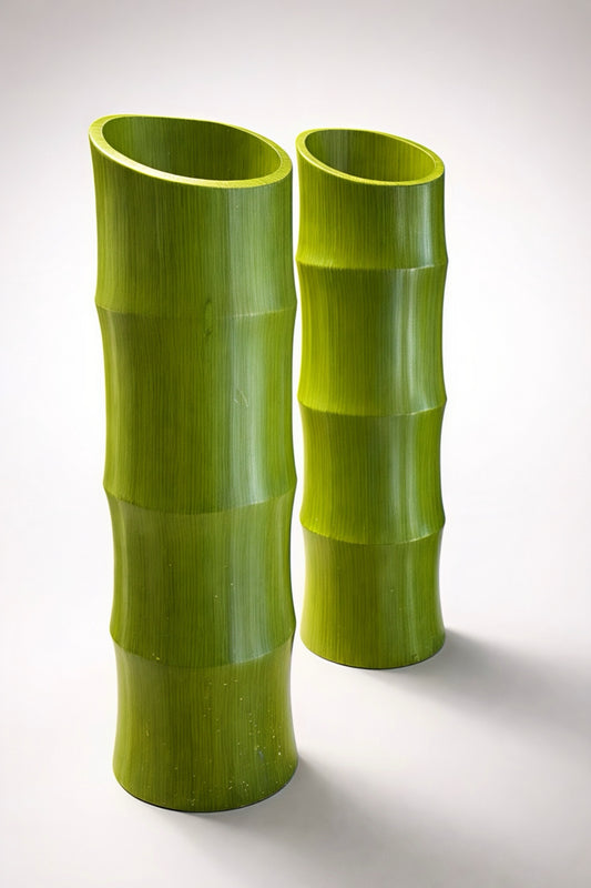Set of two modern bamboo vases in vibrant green, featuring a sleek, curved design for home decor.