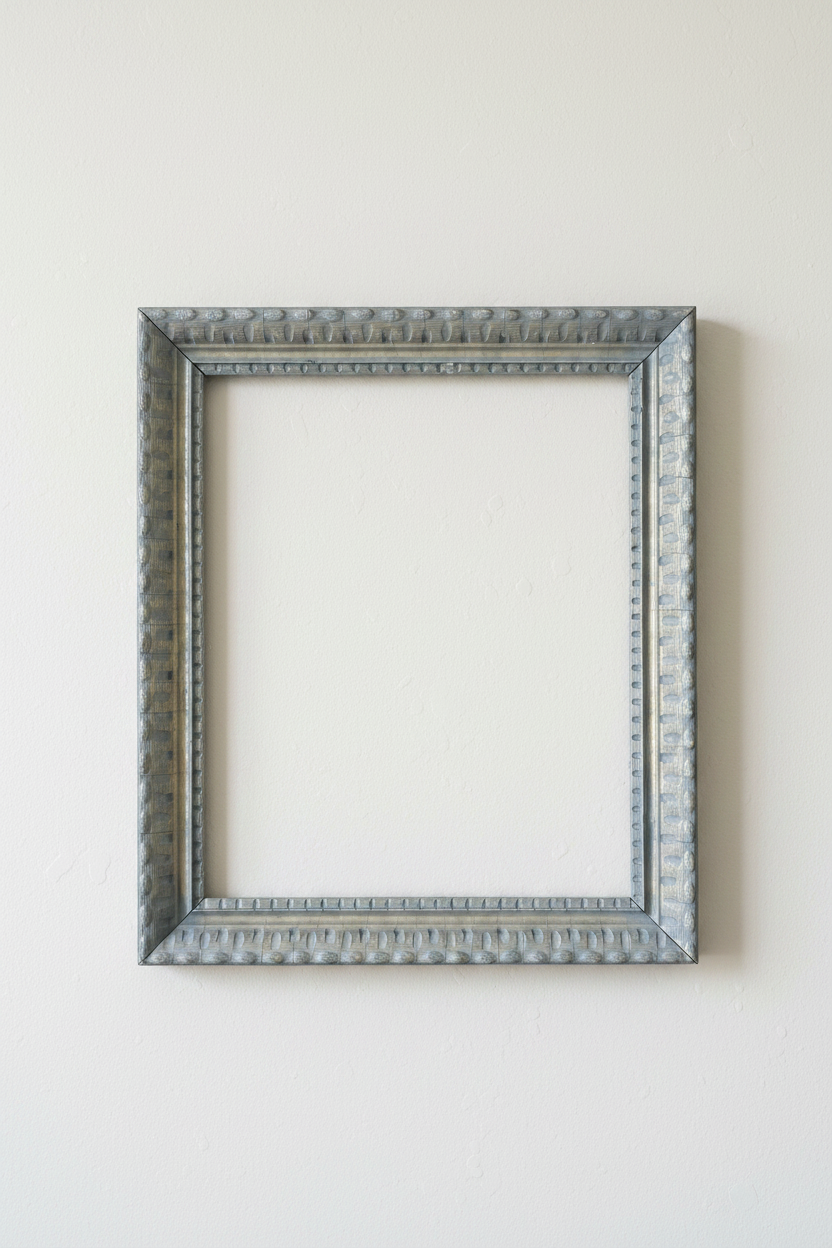 Close-up of vintage carved wood frame molding showing double-beaded egg-and-dart relief detail with aged craquelure crackle glaze and warm gilt undertones in slate blue finish