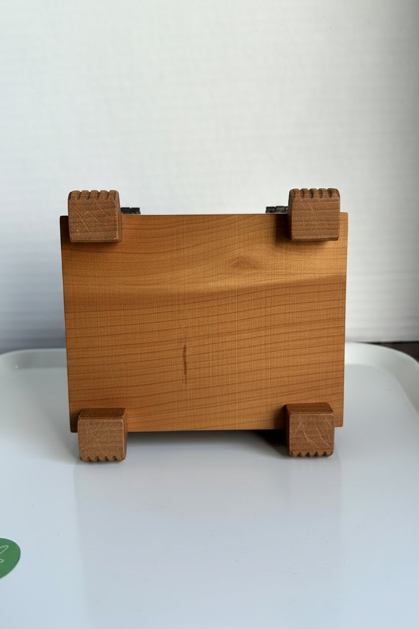  Bottom view of vintage 1940s cedar souvenir keepsake box showing natural wood base construction and four carved fluted block feet