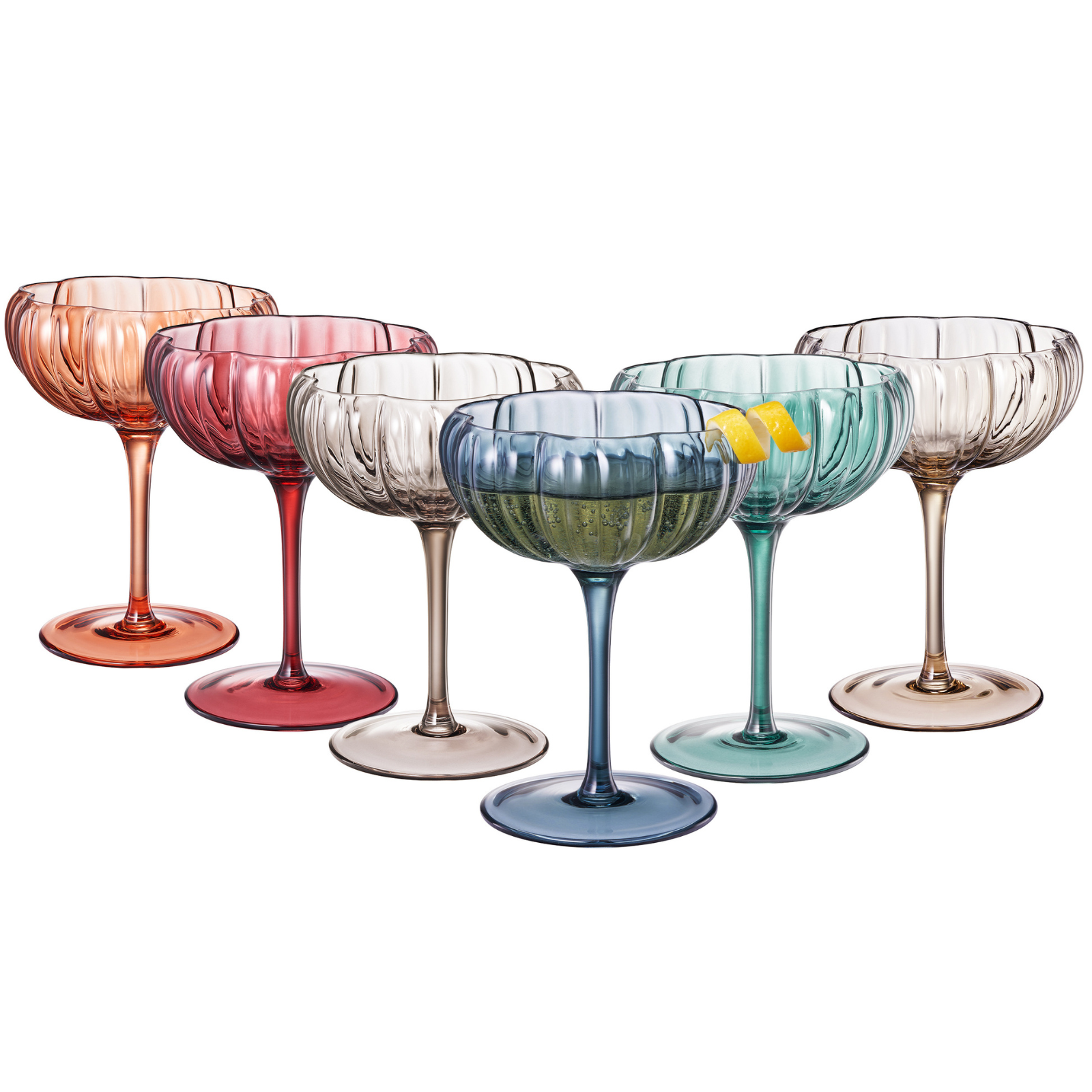Set of colorful glass cocktail glasses on a white background