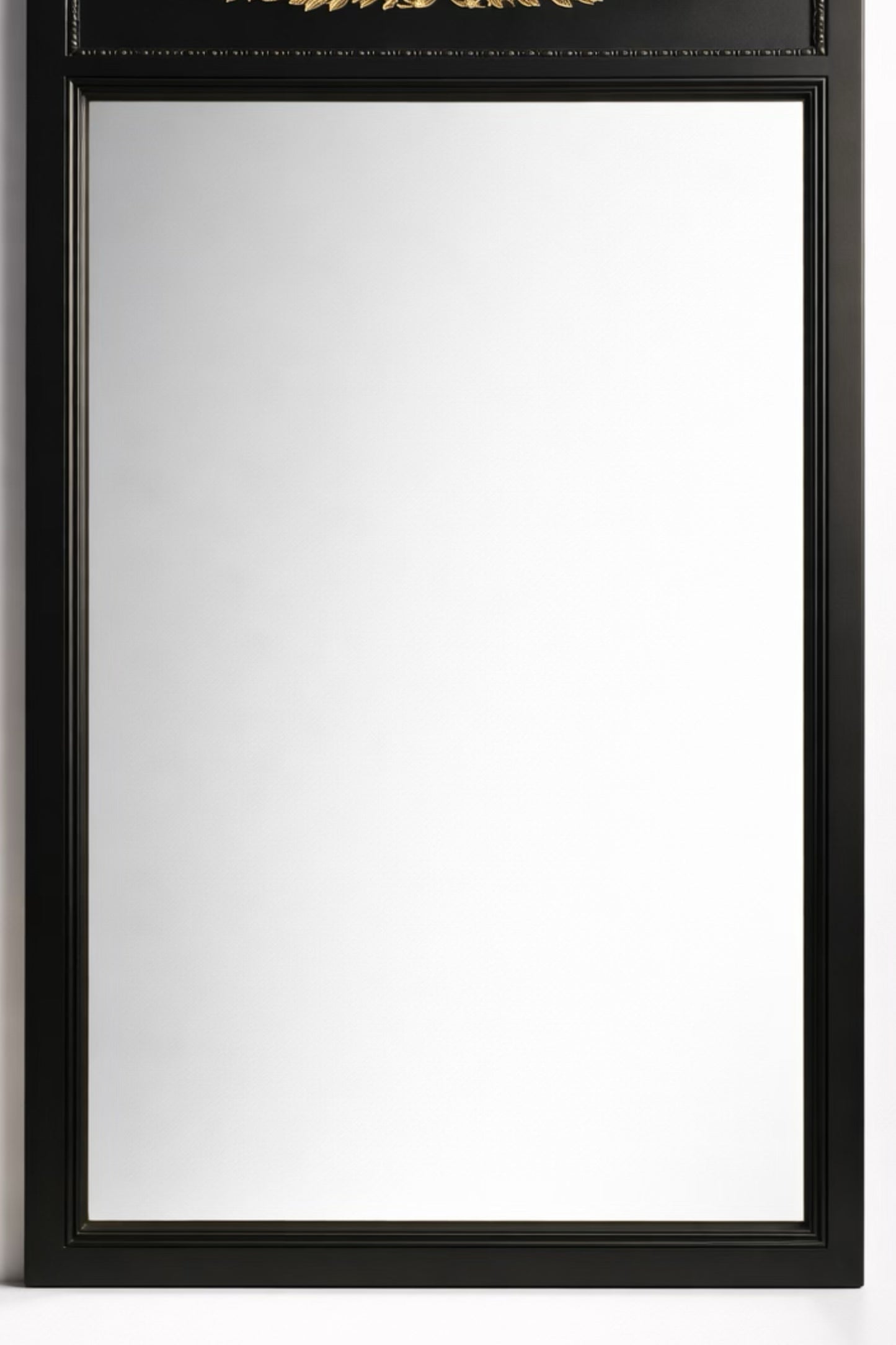 Elegant black wall mirror with ornate gold detailing, perfect for modern or vintage home decor.