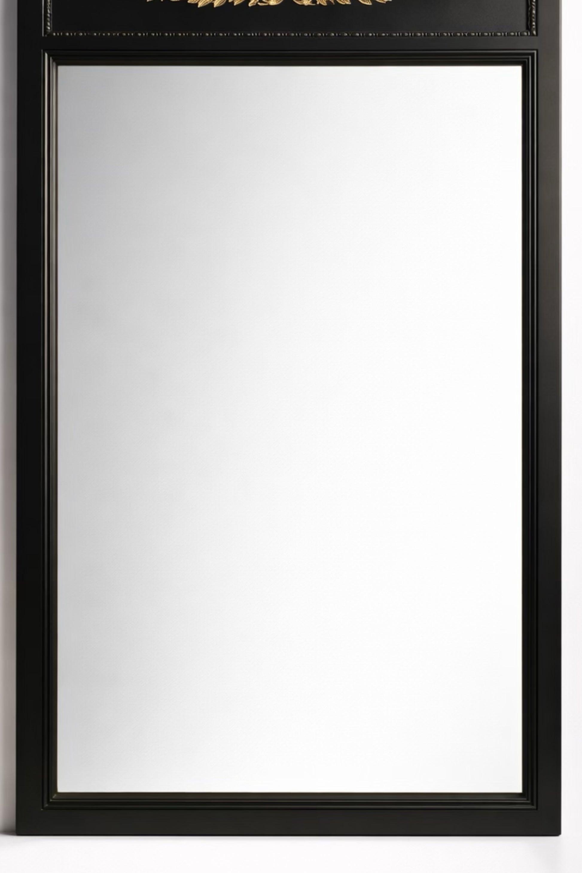 Elegant black wall mirror with ornate gold detailing, perfect for modern or vintage home decor.