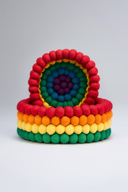 Colorful handmade felt stacking toy in rainbow hues, perfect for kids' sensory play and development.