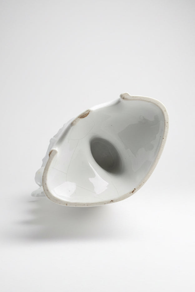 Underside of a 19th-century Rococo Revival porcelain vase, southern Germany c.1880 — unglazed base with hollow interior visible through the stem, showing age-appropriate wear consistent with 140+ years