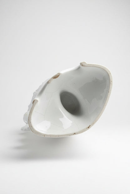 Underside of a 19th-century Rococo Revival porcelain vase, southern Germany c.1880 — unglazed base with hollow interior visible through the stem, showing age-appropriate wear consistent with 140+ years