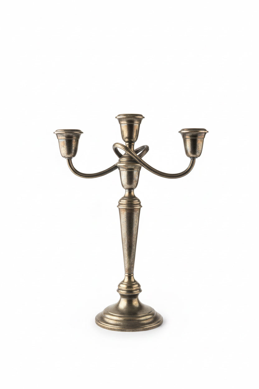 Gorham Newport silverplate 3-light candelabra fully assembled with three curved arms and bobeche candle cups, tapered column and stepped base, warm oxidized tarnish patina, white background
