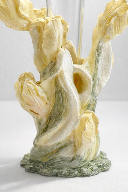 Decorative sculpture of twisted leaves on a white background