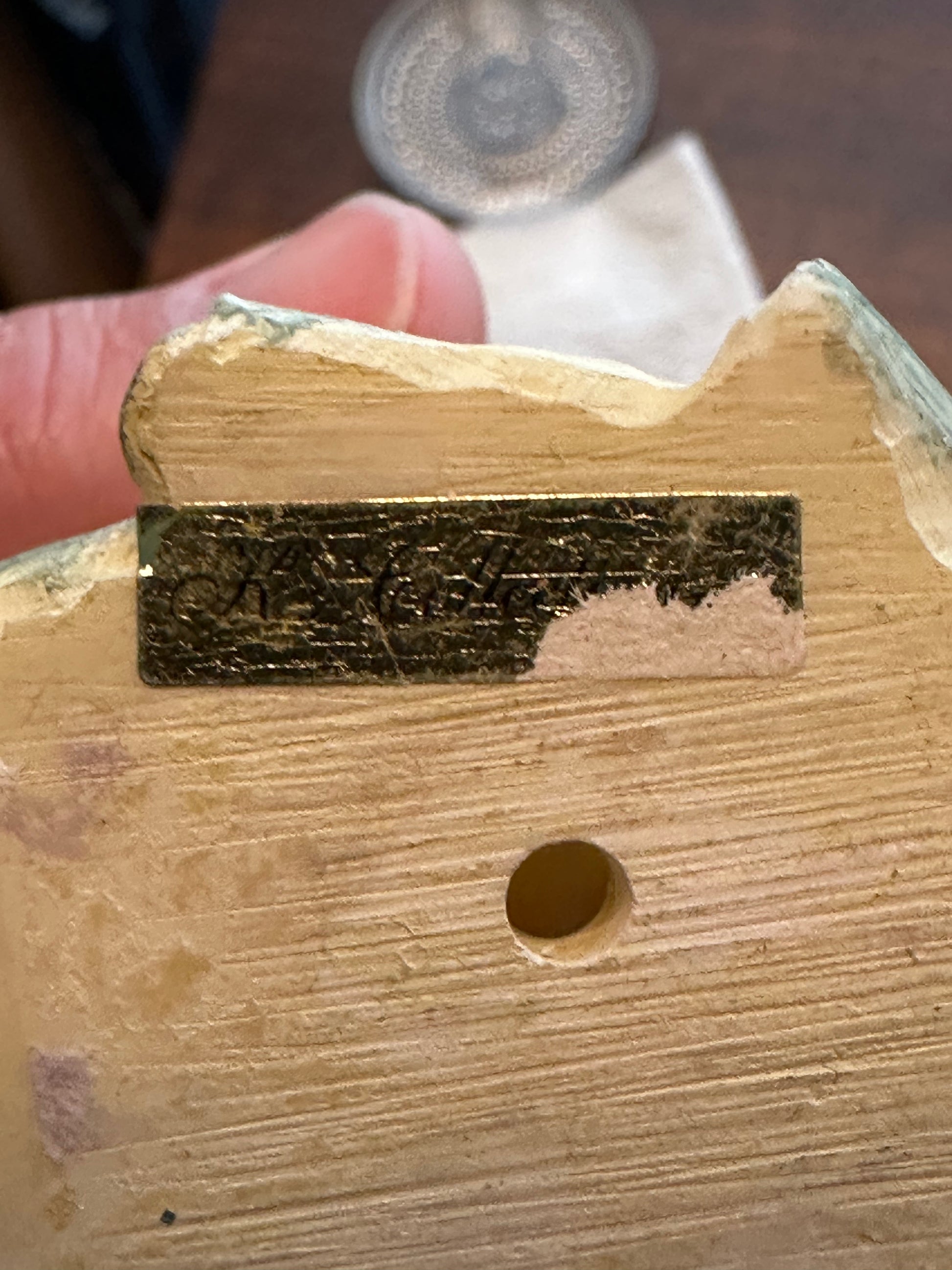 base of vintage bud vase showing makers label
