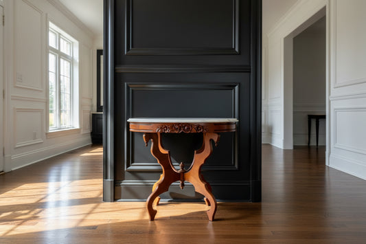 Wooden console table in a room with white walls and wooden floor