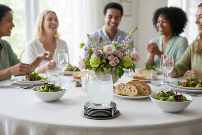 Metallic round silver coasters with engraved scallop shell using at a lunch athering