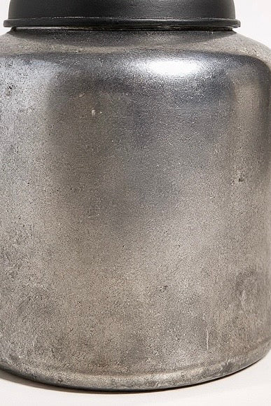 handcrafted terracotta vessel with antiqued silver leaf and wooden lid—perfect for storing or styling. A quiet gleam, a grounded soul.