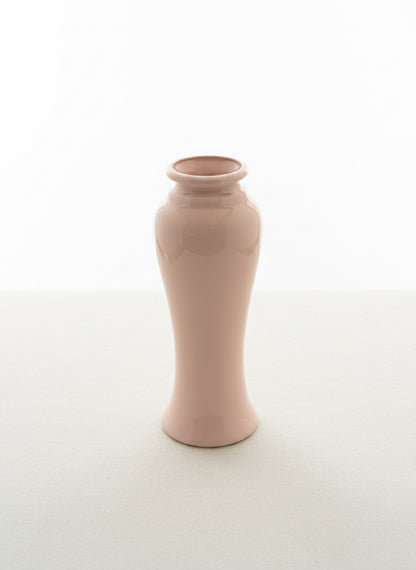 Pink ceramic vase on a white background