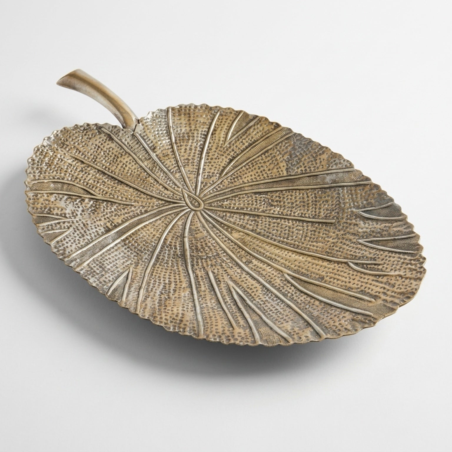 Textured champagne gold cast metal elephant ear leaf catchall tray with polished handle stem