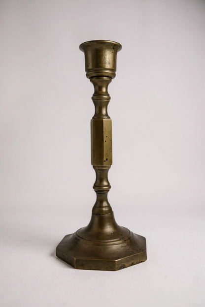 Brasscandlestick on a white background front view


