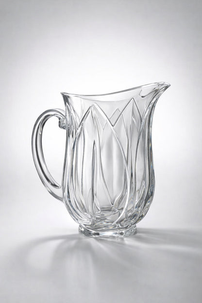Clear glass pitcher with decorative design on a gray background - Vintage Cristal d'Arques "Pompano" Glass Pitcher | Pressed Glass Tulip Pattern | Made in France