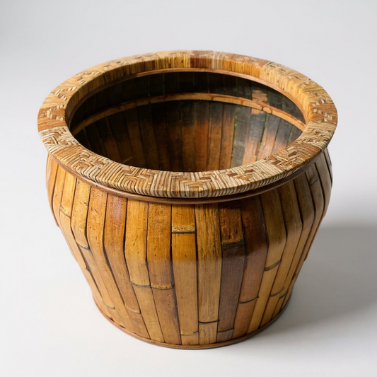 Wooden barrel-shaped planter on a white background

