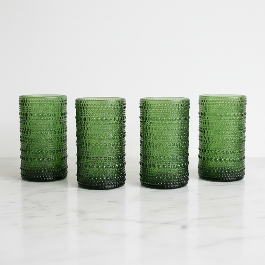 Set of four olive green hobnail highball cooler glasses on white marble, Home Essentials Halo collection
