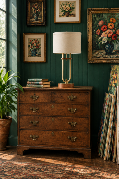 Revised lamp lifestyle image on a wooden chest against the green wall