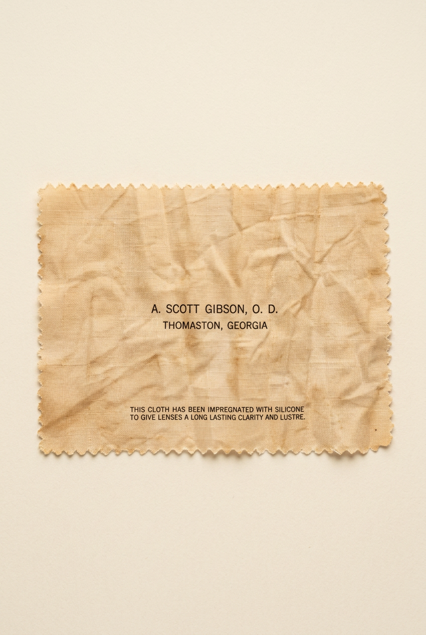 Vintage printed cleaning cloth on an ivory background