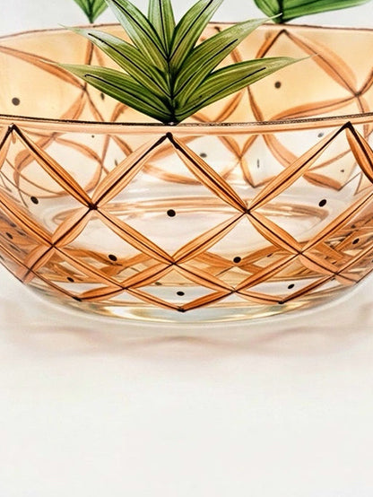 Vintage hand-blown Romanian crystal bowl featuring a hand-painted amber pineapple lattice pattern, green fronds, and a gold-trimmed rim by Crystal Clear Industries.⁠